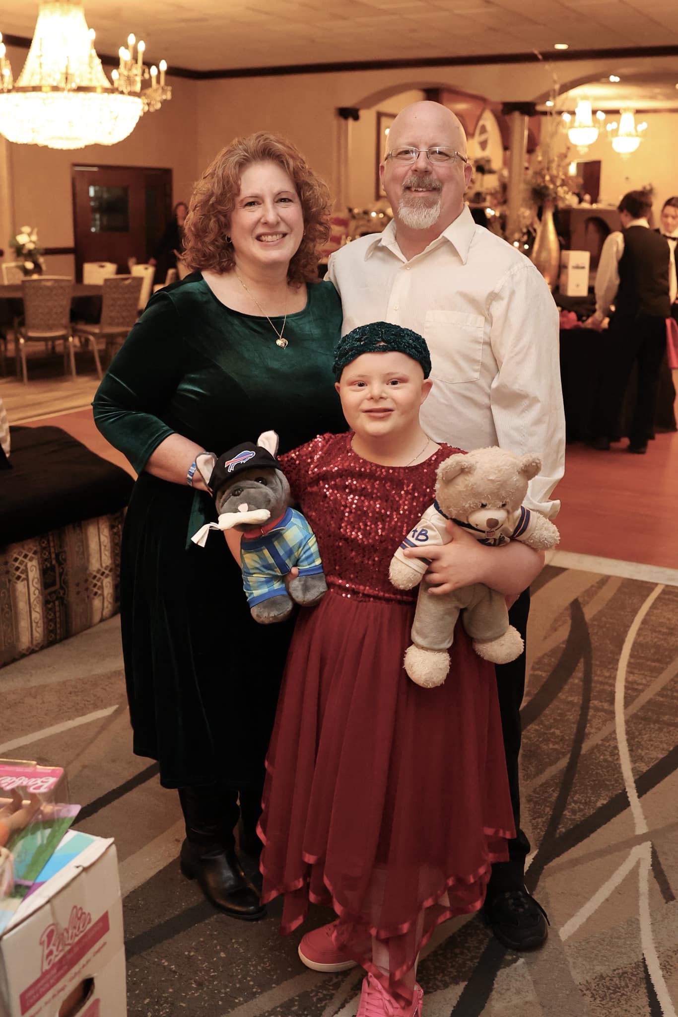 Abbie at the gala holding an Abbie's Angels bear